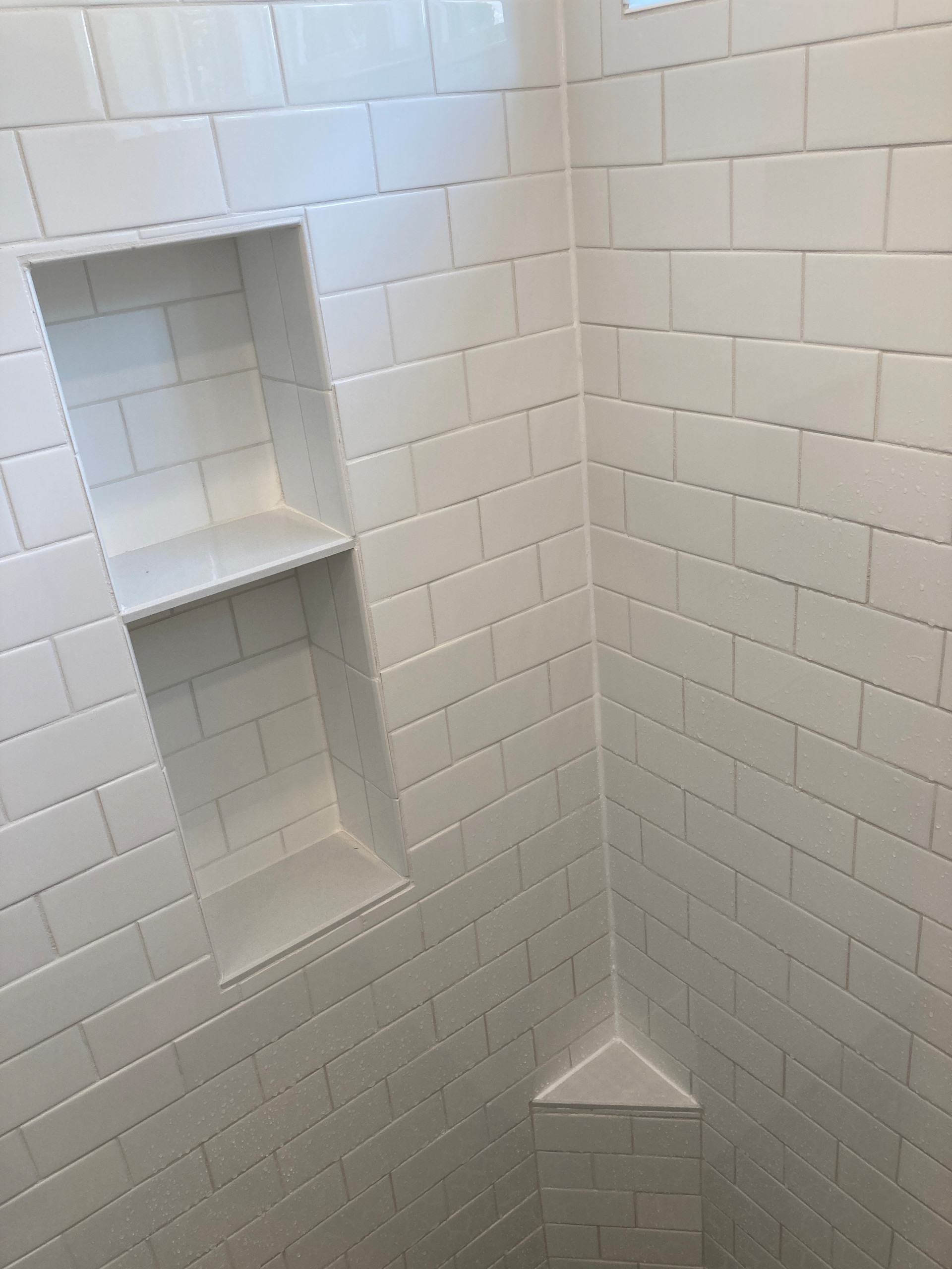 Subway tile shower and stone