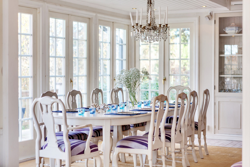 Design ideas for a large traditional separate dining room in Stockholm with beige walls.