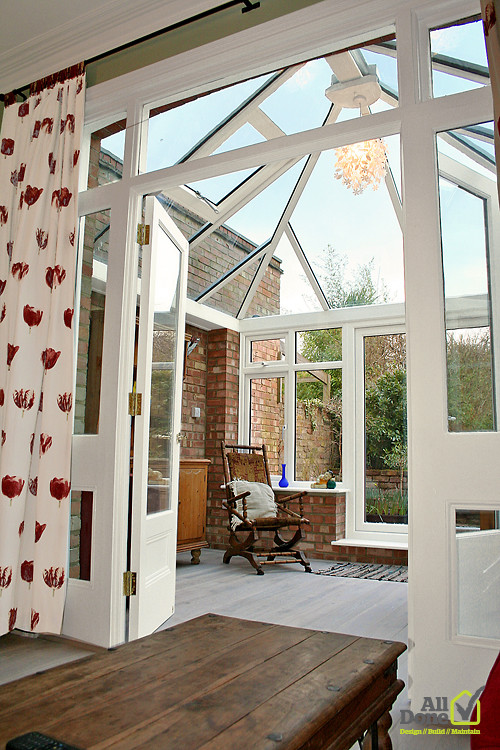 Design ideas for a traditional sunroom in London.