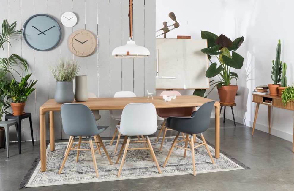 Inspiration for a mid-sized scandinavian open plan dining in Moscow with white walls and concrete floors.
