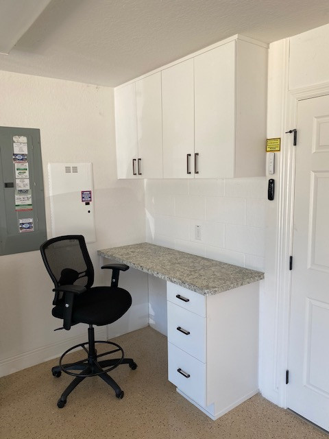 Mid-sized attached garage workshop photo