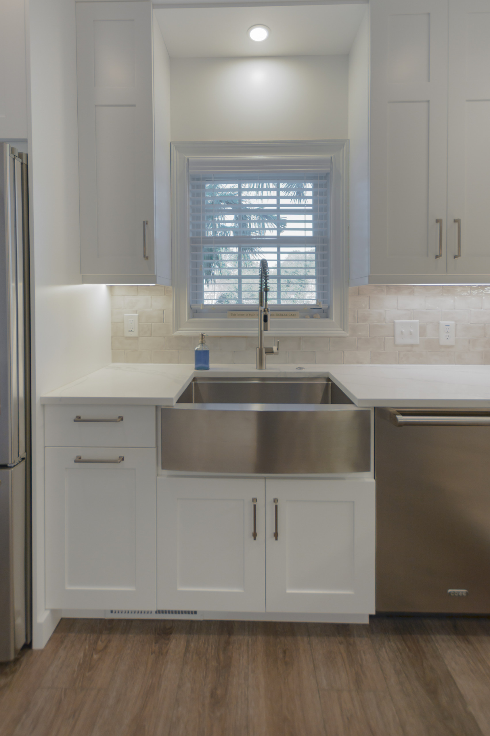 Pawley's Island simple wihite kitchen, laundry room, bathroom, and closet
