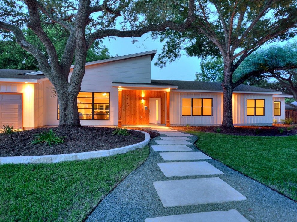 Minimalist white one-story wood exterior home photo in Austin