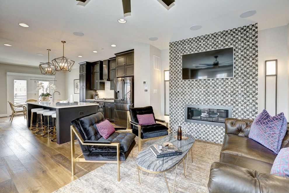 Eat-in kitchen - small transitional single-wall medium tone wood floor and brown floor eat-in kitchen idea in Baltimore with an undermount sink, quartz countertops, white backsplash, stainless steel appliances, an island, ceramic backsplash, white countertops, black cabinets and flat-panel cabinets