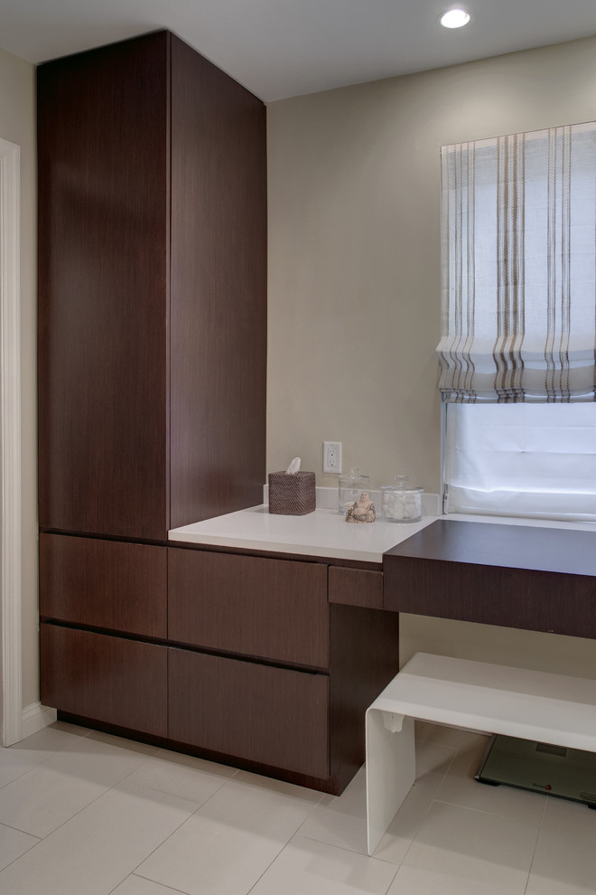 Inspiration for a large modern master gray tile home design remodel with an integrated sink, flat-panel cabinets, dark wood cabinets and gray walls