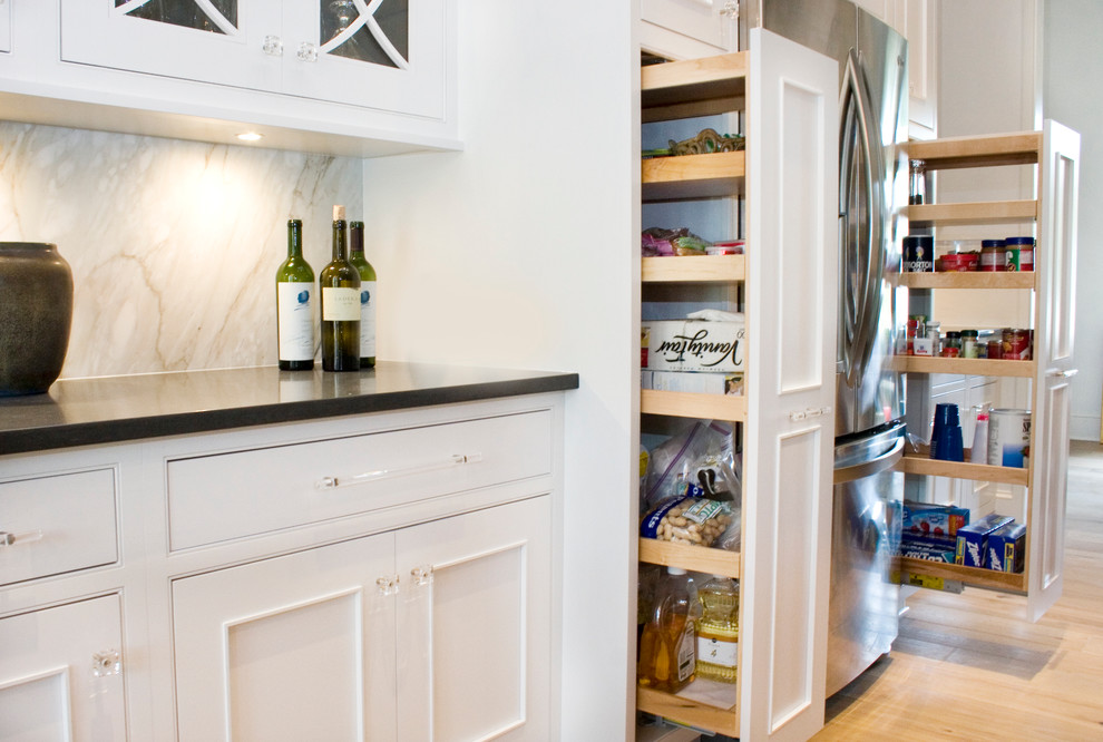 This is an example of a transitional kitchen in Miami.