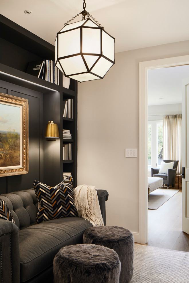 Photo of a transitional master bedroom in Austin with black walls.