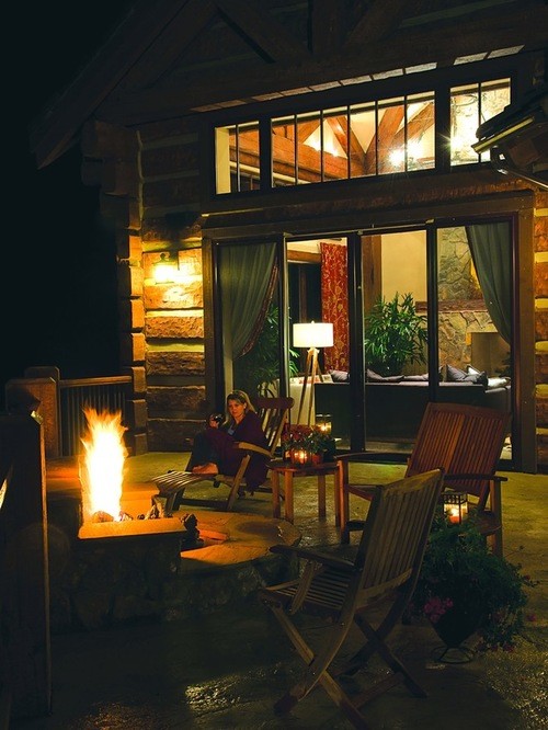 This is an example of a large country deck in Denver with a fire feature and no cover.