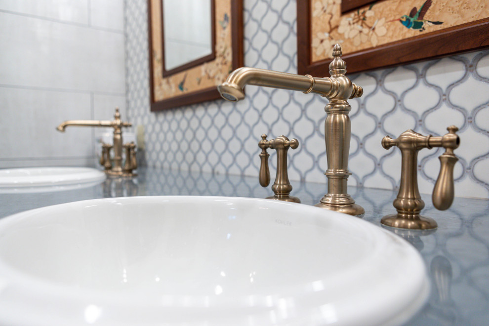 Large mountain style master gray tile and ceramic tile porcelain tile, gray floor and double-sink claw-foot bathtub photo in Seattle with dark wood cabinets, a one-piece toilet, white walls, a drop-in sink, quartz countertops, a hinged shower door, gray countertops and a built-in vanity
