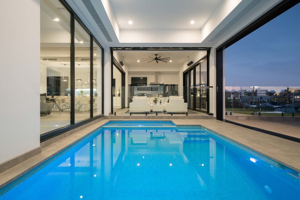 Photo of a modern indoor lap pool in Melbourne.