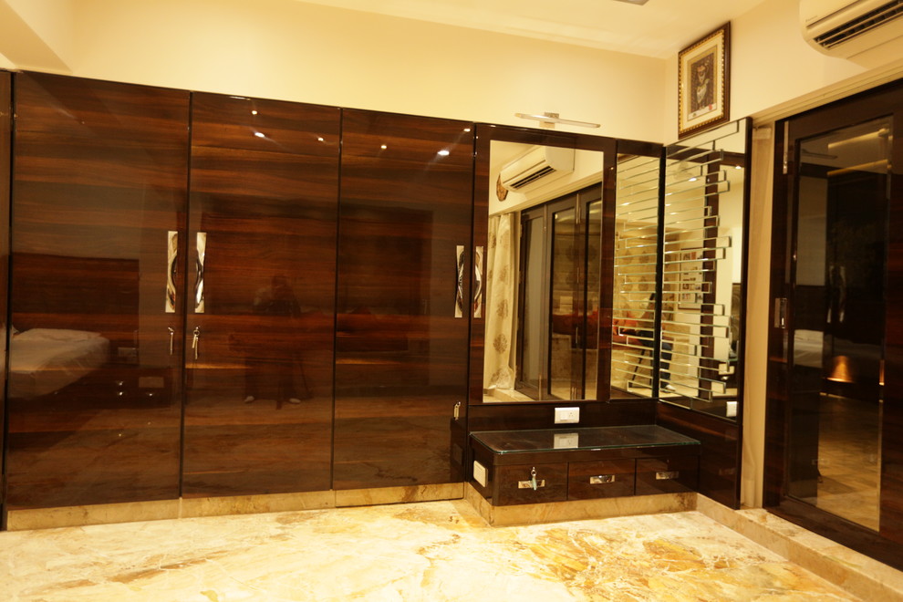 Design ideas for a storage and wardrobe in Mumbai.