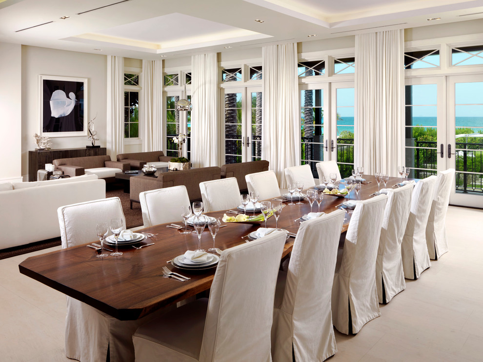 This is an example of a mid-sized contemporary dining room in Miami with no fireplace.