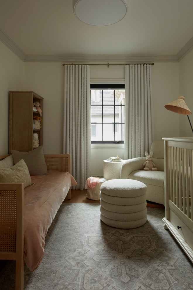 Example of a transitional nursery design in Toronto