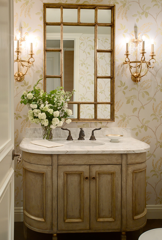 Design ideas for a traditional powder room in San Francisco with an undermount sink, recessed-panel cabinets and light wood cabinets.