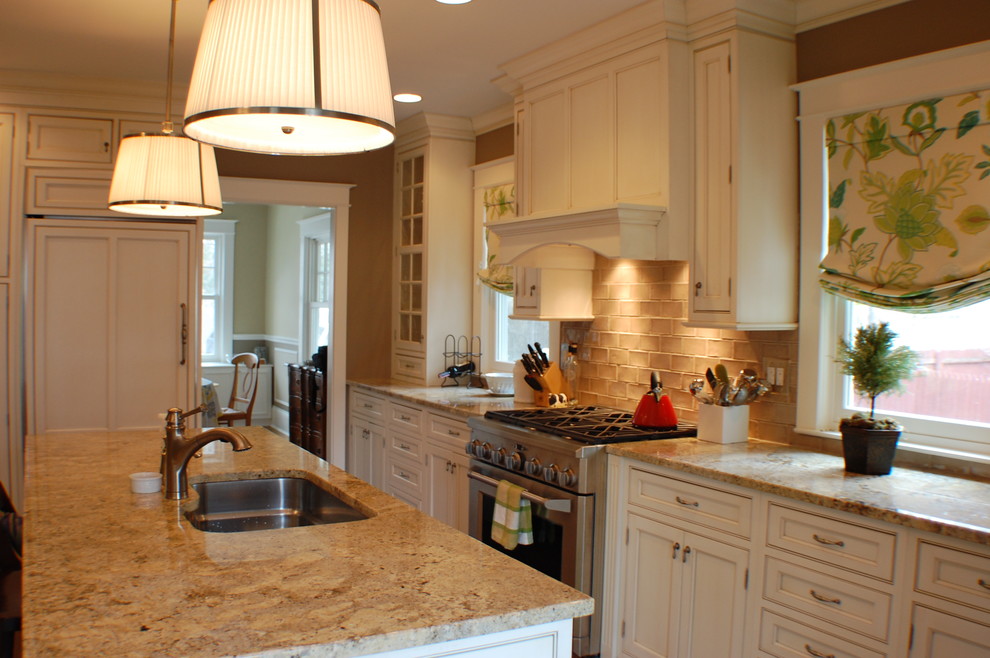 Example of a transitional kitchen design in New York