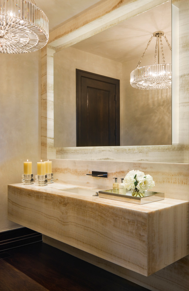 Contemporary powder room in Denver with an undermount sink, marble benchtops and marble.