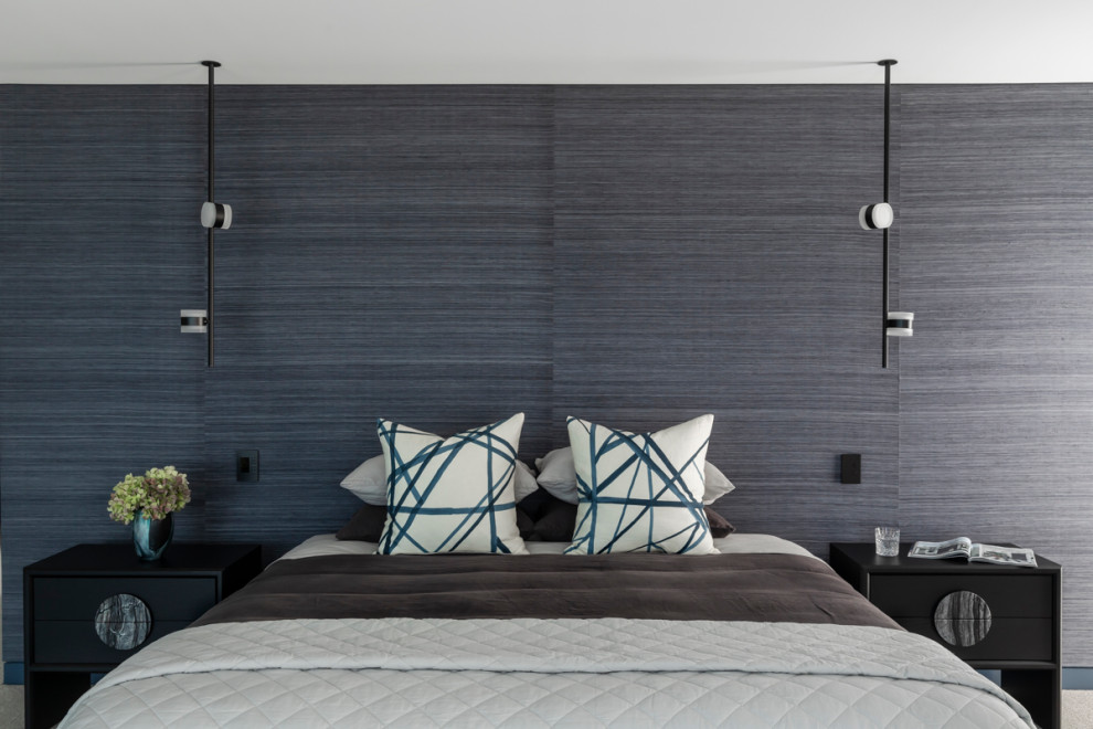Large contemporary master bedroom in Sydney with blue walls.