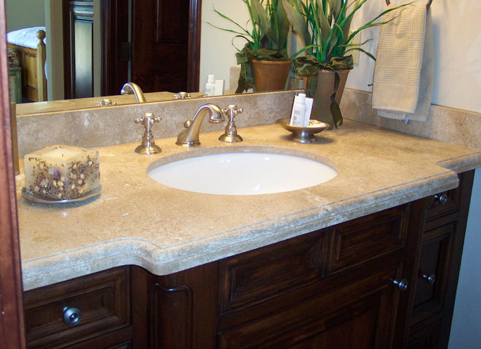 Mid-sized white tile bathroom photo with recessed-panel cabinets, medium tone wood cabinets and granite countertops
