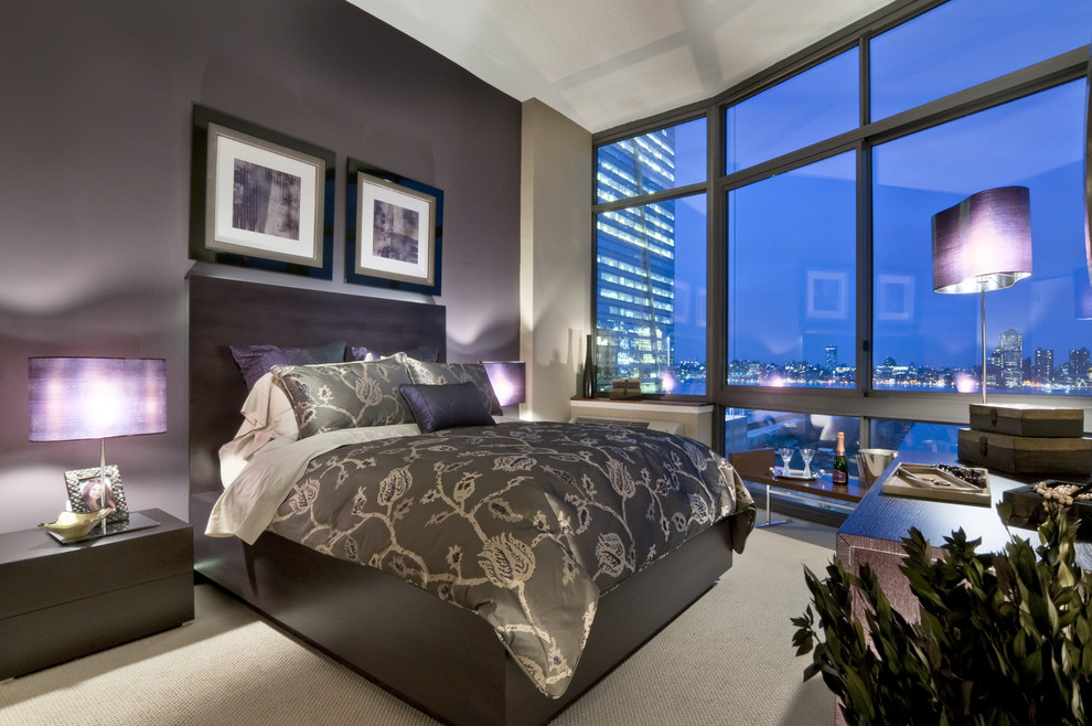 Inspiration for a contemporary bedroom in New York with purple walls and carpet.