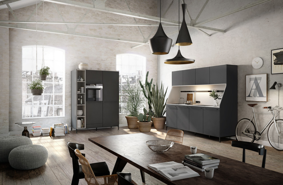 Modern single-wall open plan kitchen in Tokyo with flat-panel cabinets, grey cabinets and grey splashback.