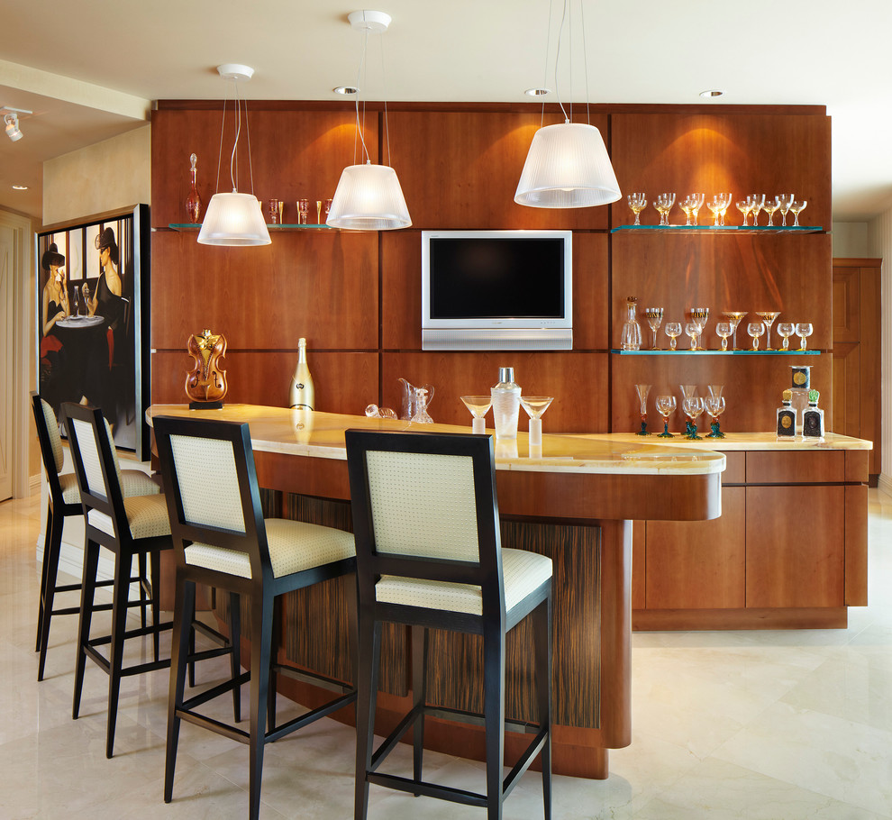 Contemporary home bar in Miami with concrete floors.
