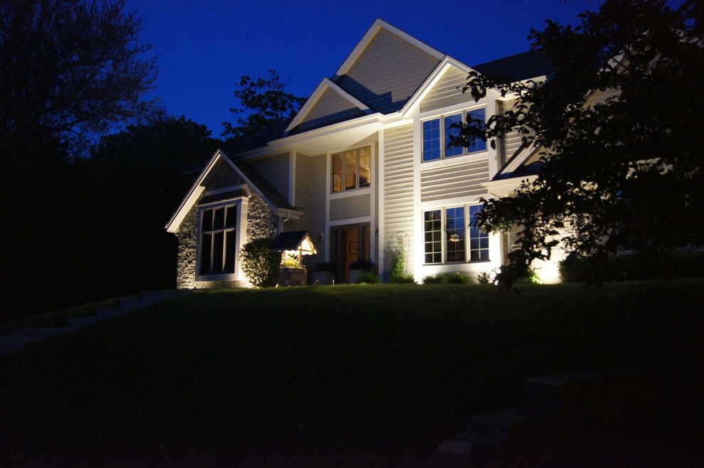 Large transitional gray two-story mixed siding exterior home photo