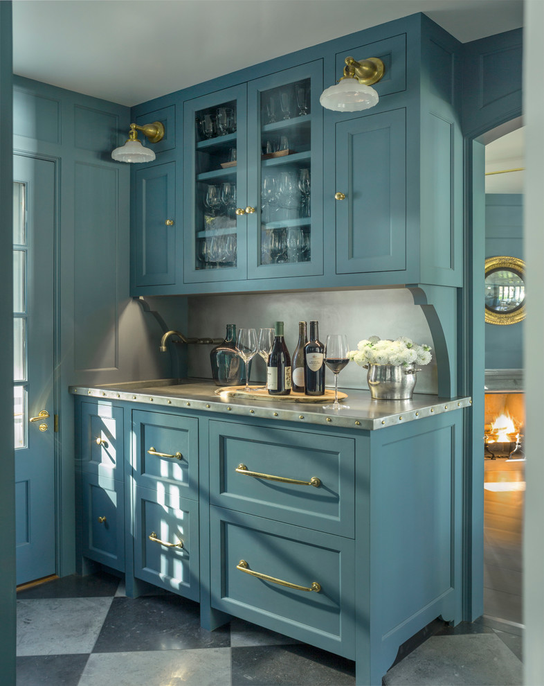 Inspiration for a country single-wall wet bar in Burlington with an integrated sink, shaker cabinets, blue cabinets, stainless steel benchtops, grey splashback, grey floor and grey benchtop.