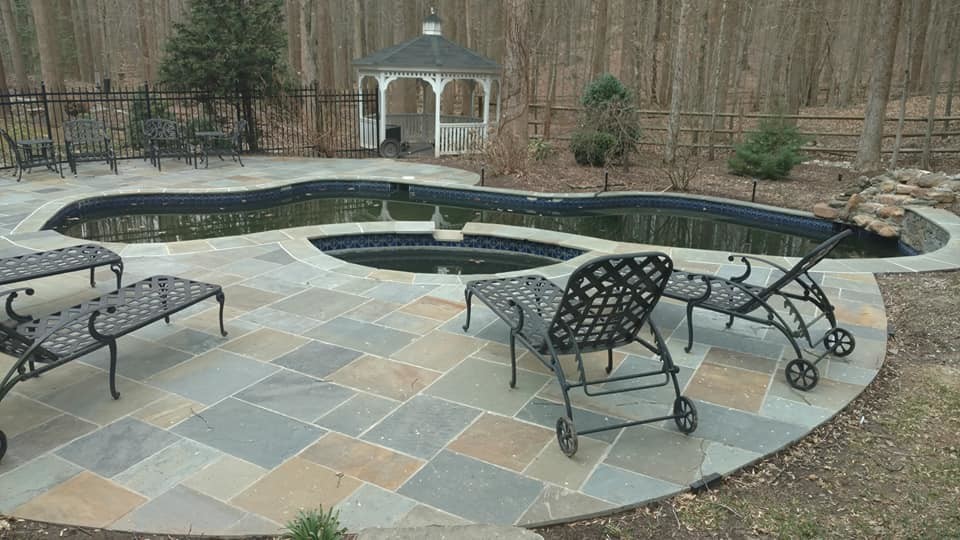 Pool - huge transitional backyard stone and kidney-shaped natural pool idea