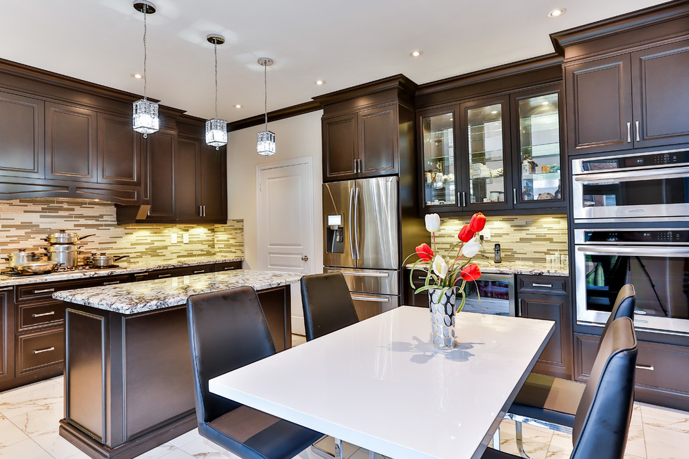 Example of a transitional kitchen design in Toronto