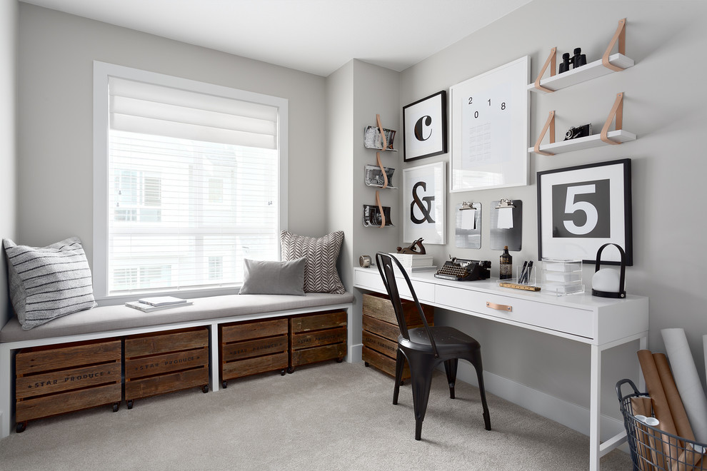 Design ideas for a transitional study room in Vancouver with grey walls, carpet, a built-in desk and grey floor.