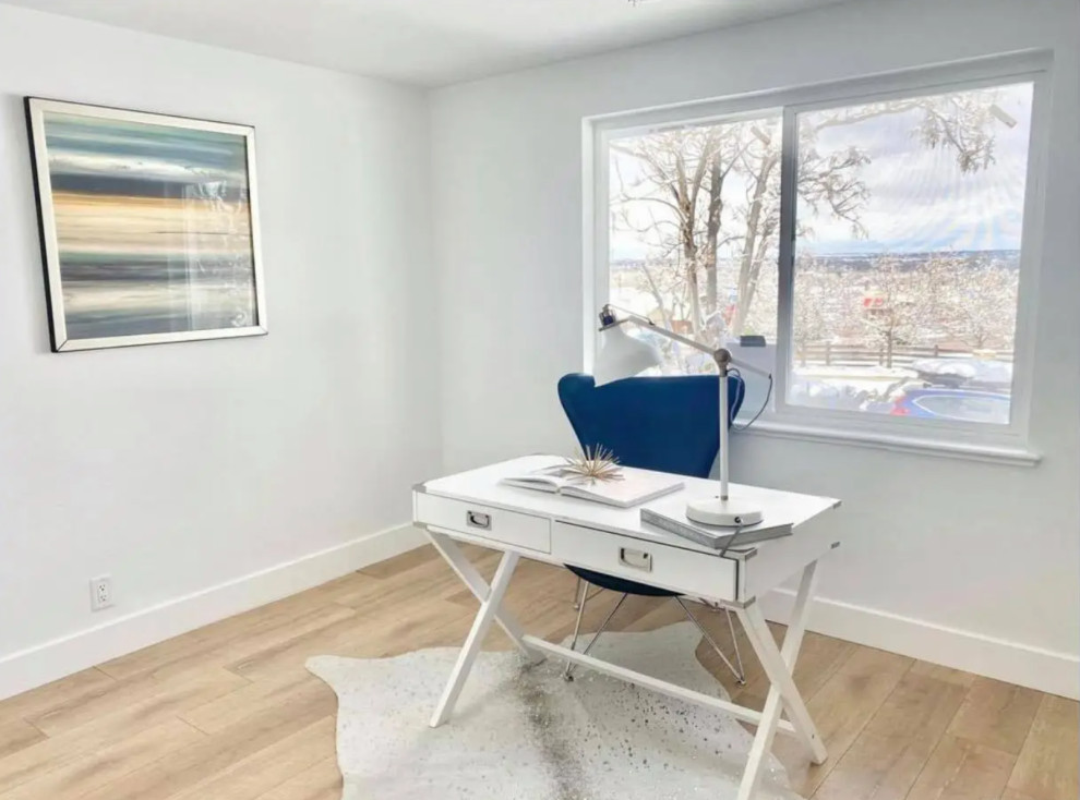 Transitional home design photo in Denver