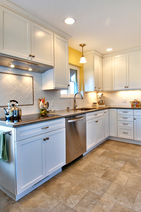 Example of a transitional kitchen design in Seattle