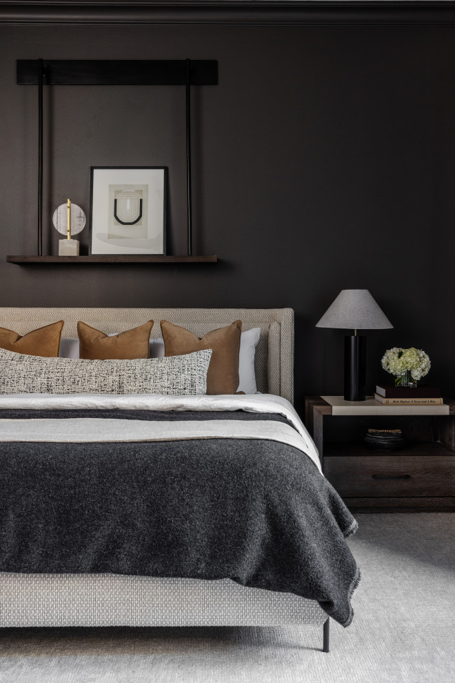 Example of a transitional bedroom design in Charlotte