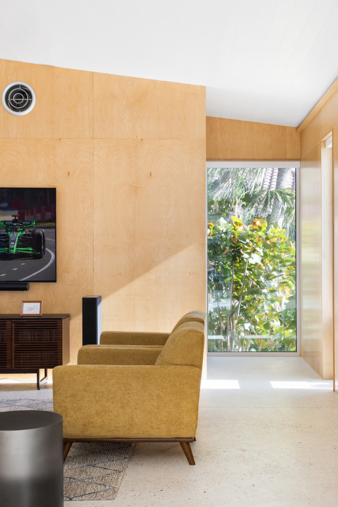 Идея дизайна: маленькая комната для игр в современном стиле с бетонным полом, телевизором на стене, серым полом, потолком из вагонки и деревянными стенами для на участке и в саду