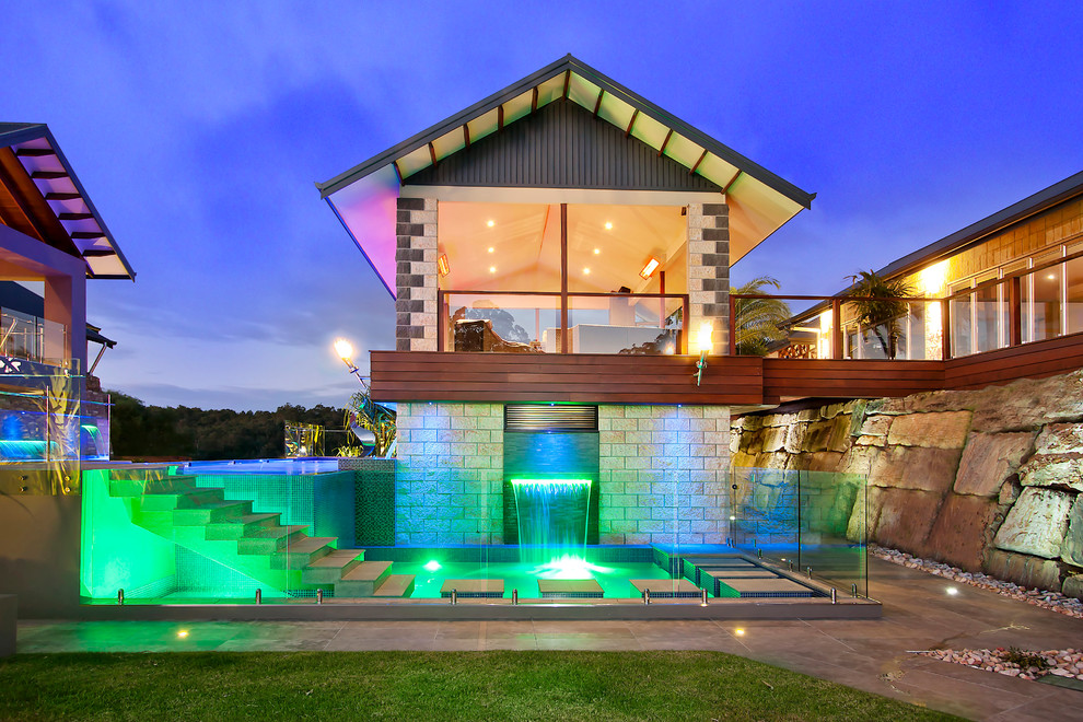 Mid-sized contemporary custom-shaped pool in Brisbane.