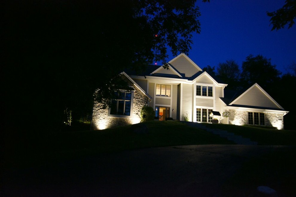 Large transitional gray two-story mixed siding exterior home photo
