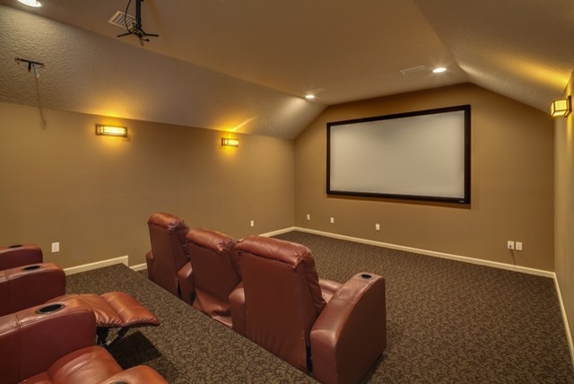 Inspiration for a contemporary home cinema in Jacksonville.