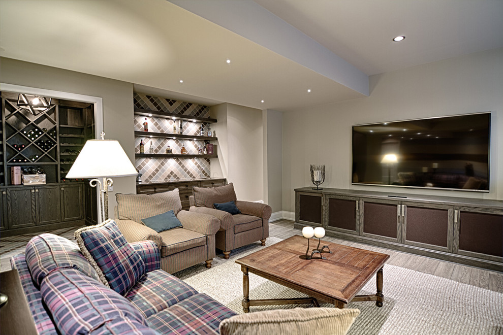 Example of a transitional home design design in Calgary