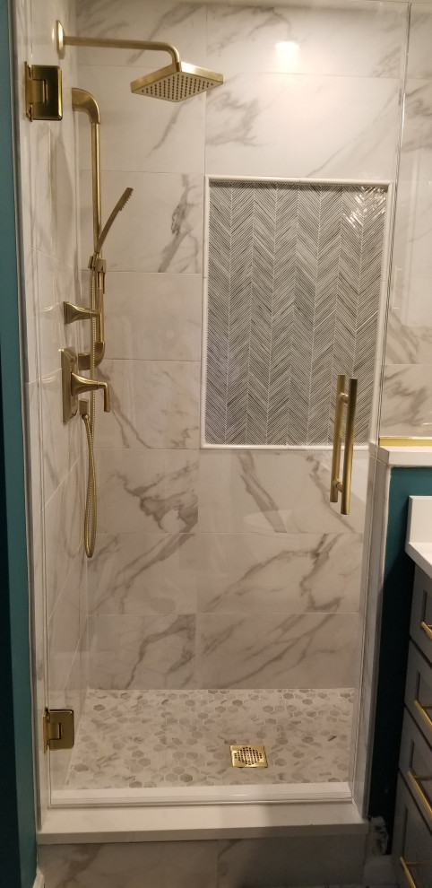 Inspiration for a mid-sized transitional master bathroom in Boston with recessed-panel cabinets, blue cabinets, an open shower, multi-coloured tile, porcelain tile, porcelain floors, an undermount sink, engineered quartz benchtops, a hinged shower door, white benchtops, a single vanity and a built-in vanity.