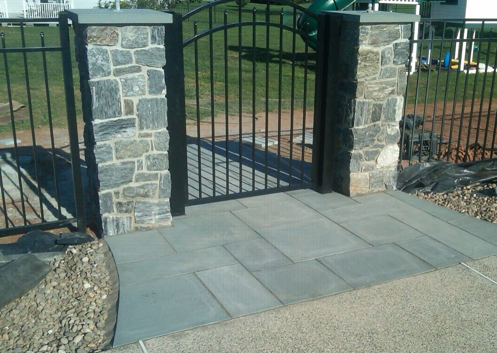 stone piers with flagstone walkway