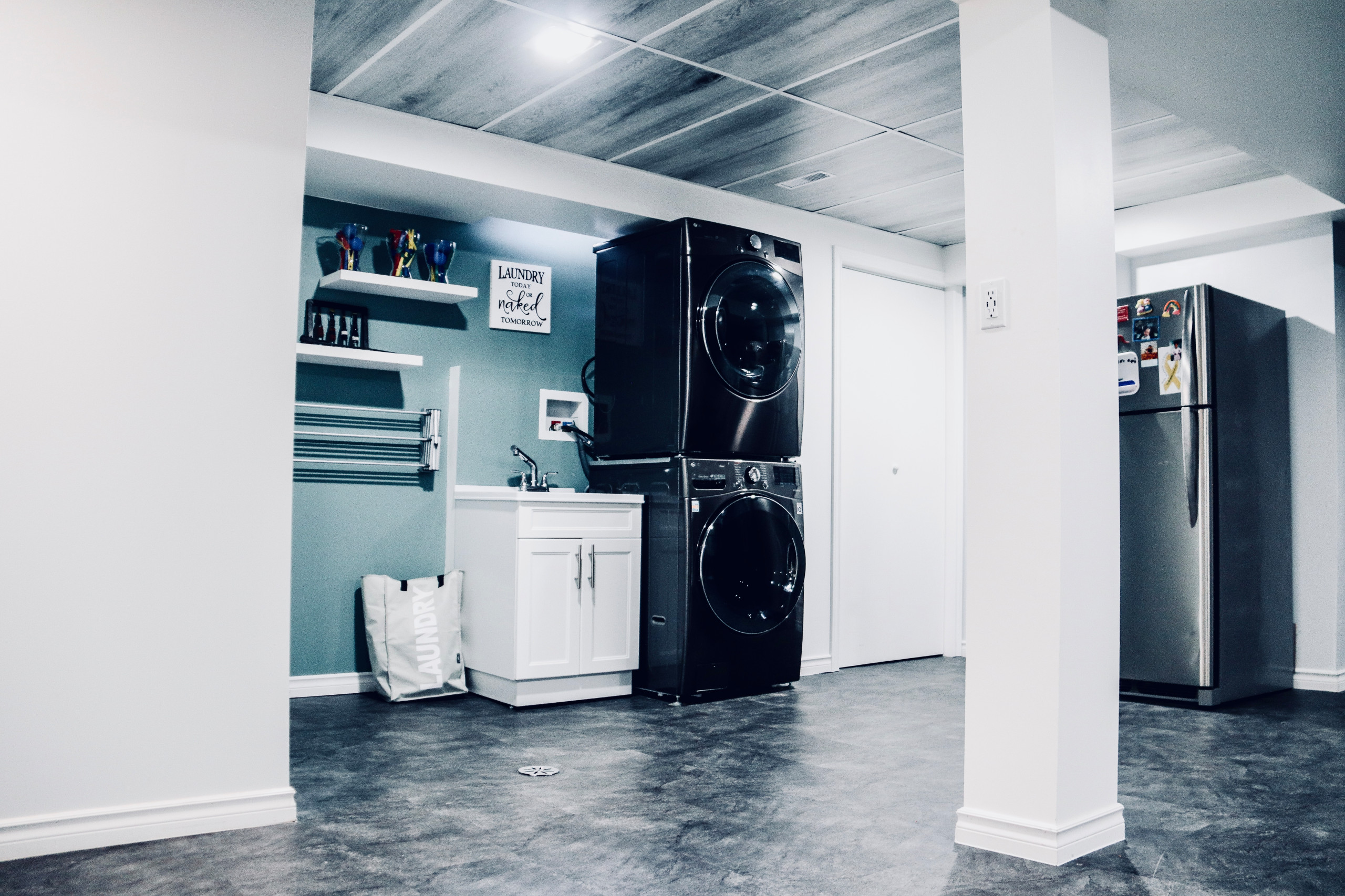 Basement Laundry Room Organizing with Teal Bins