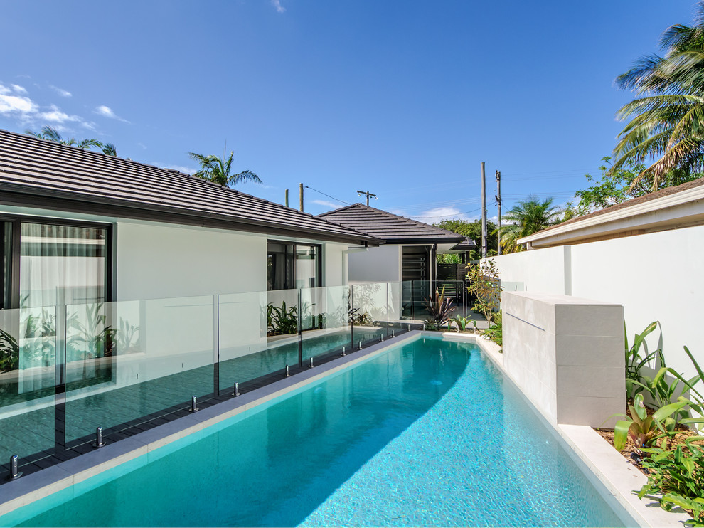 This is an example of a contemporary pool in Gold Coast - Tweed.