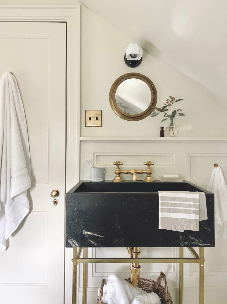Design ideas for a mid-sized transitional bathroom in Philadelphia with a claw-foot tub, a shower/bathtub combo, a bidet, multi-coloured tile, marble, beige walls, marble floors, a console sink, marble benchtops, a shower curtain, a single vanity and decorative wall panelling.