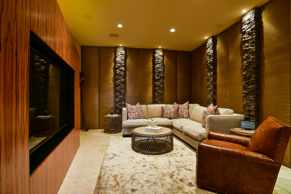 Inspiration for a large contemporary enclosed home theatre in Other with beige walls, travertine floors and a built-in media wall.