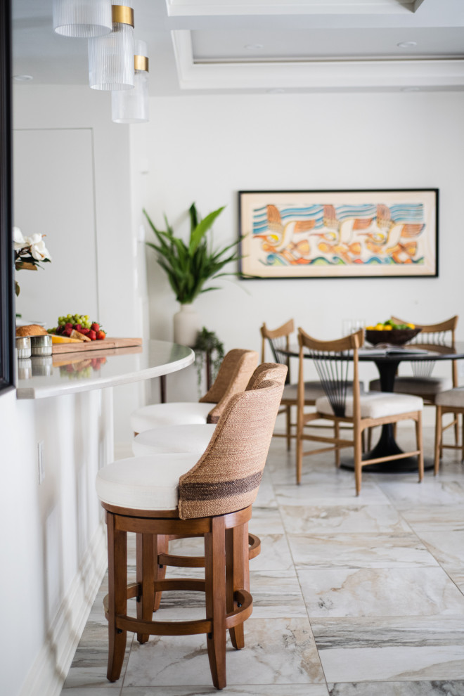 Kitchen - small kitchen idea with beige cabinets and stainless steel appliances