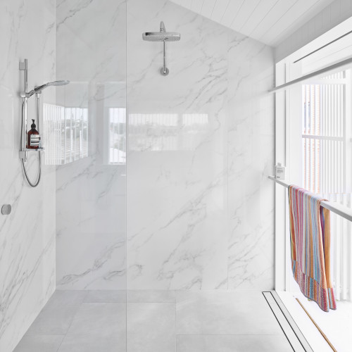 Contemporary Simplicity: White Marble Shower Tiles Define the Essence of Your Bathroom