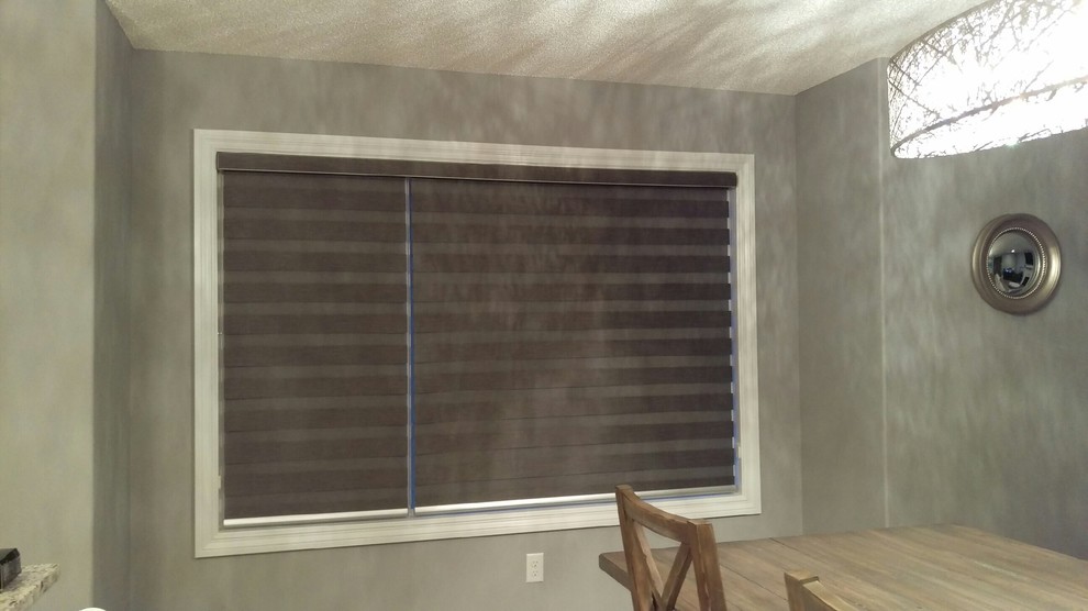 Transitional dining room photo in Calgary