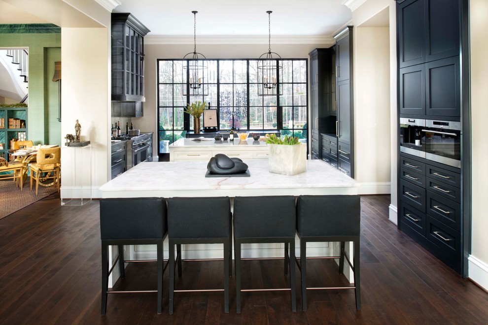 Design ideas for a transitional kitchen in Atlanta with quartzite benchtops and multiple islands.