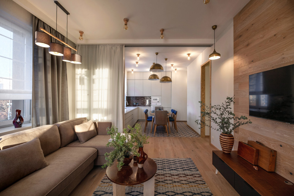 Стильный дизайн: маленькая гостиная комната в скандинавском стиле для на участке и в саду - последний тренд