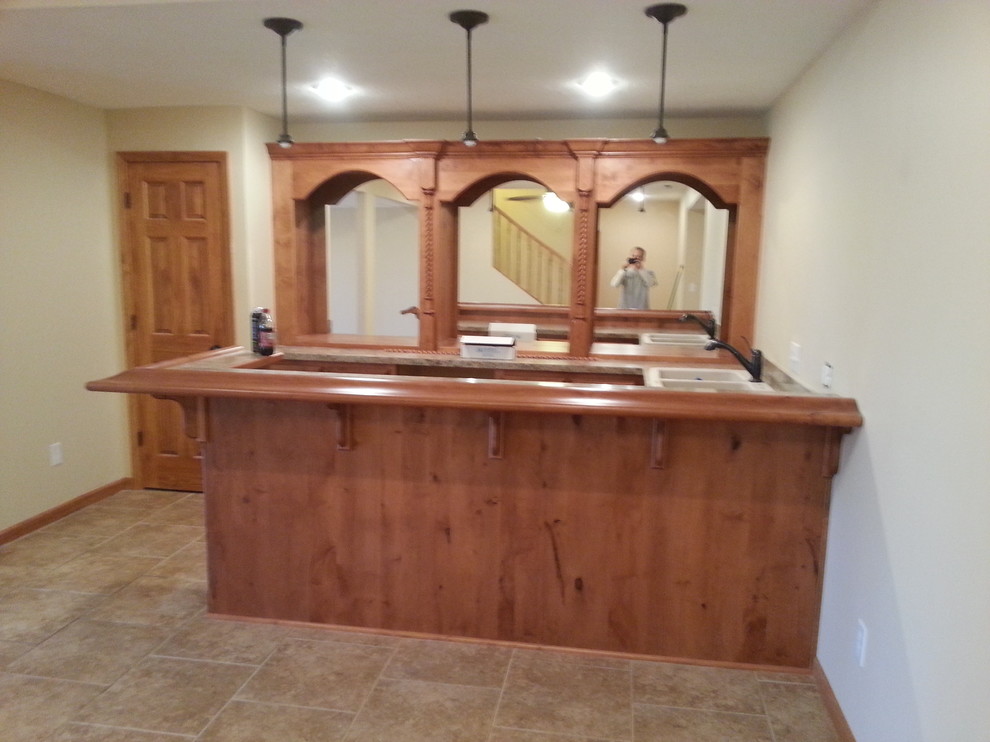 Example of a mid-sized walk-out basement design